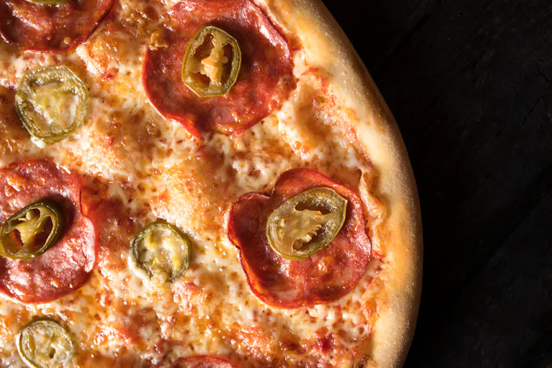 The Deluxe pizza with pepperoni sausage and vegetables